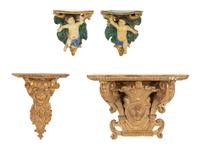 A Pair of Tin-Glazed Earthenware Wall Brackets, and Two Giltwood Wall Brackets