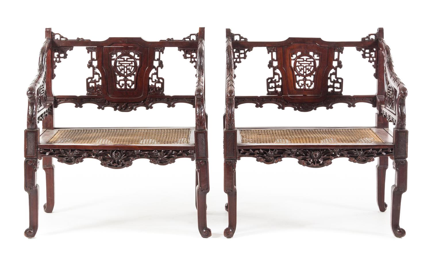 A Pair of Chinese Carved Armchairs Height 36 x width 30 1/2 x depth 18 3/4 inches. — 19TH/20TH CENTURY