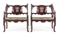 A Pair of Chinese Carved Armchairs Height 36 x width 30 1/2 x depth 18 3/4 inches. — 19TH/20TH CENTURY