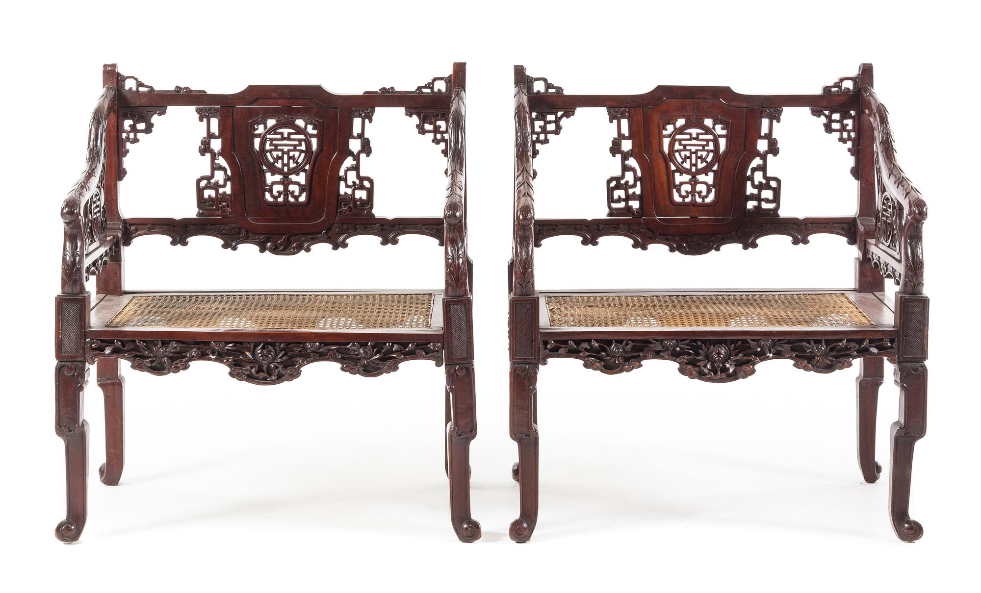 A Pair of Chinese Carved Armchairs Height 36 x width 30 1/2 x depth 18 3/4 inches. — 19TH/20TH CENTURY