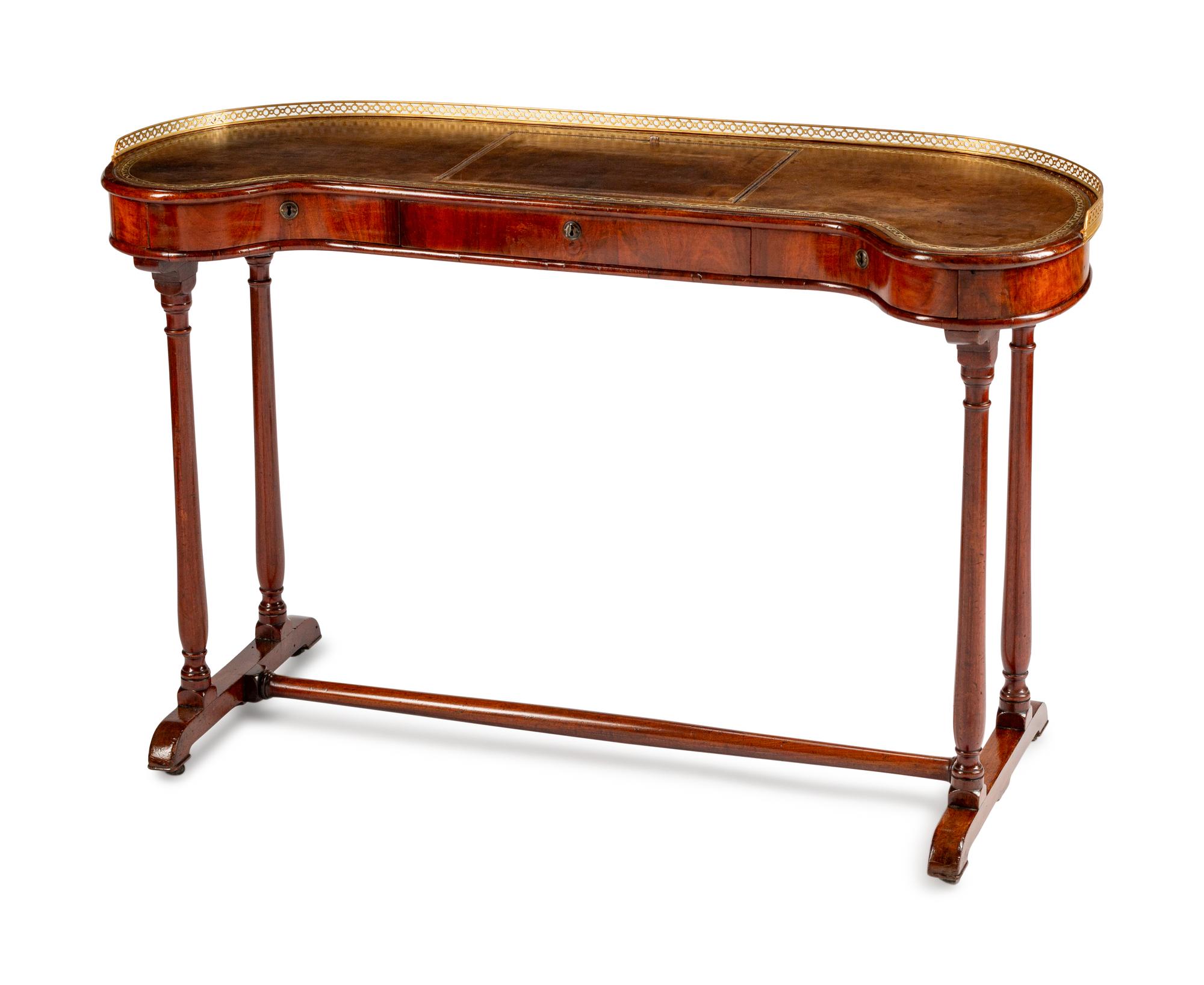 An English Brass-Mounted Mahogany Kidney-Shaped Reading Table — 19TH CENTURY