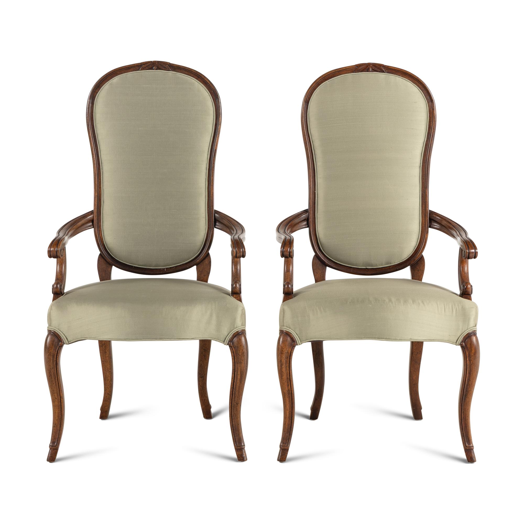 A Pair of Regence Style Walnut Fauteuils