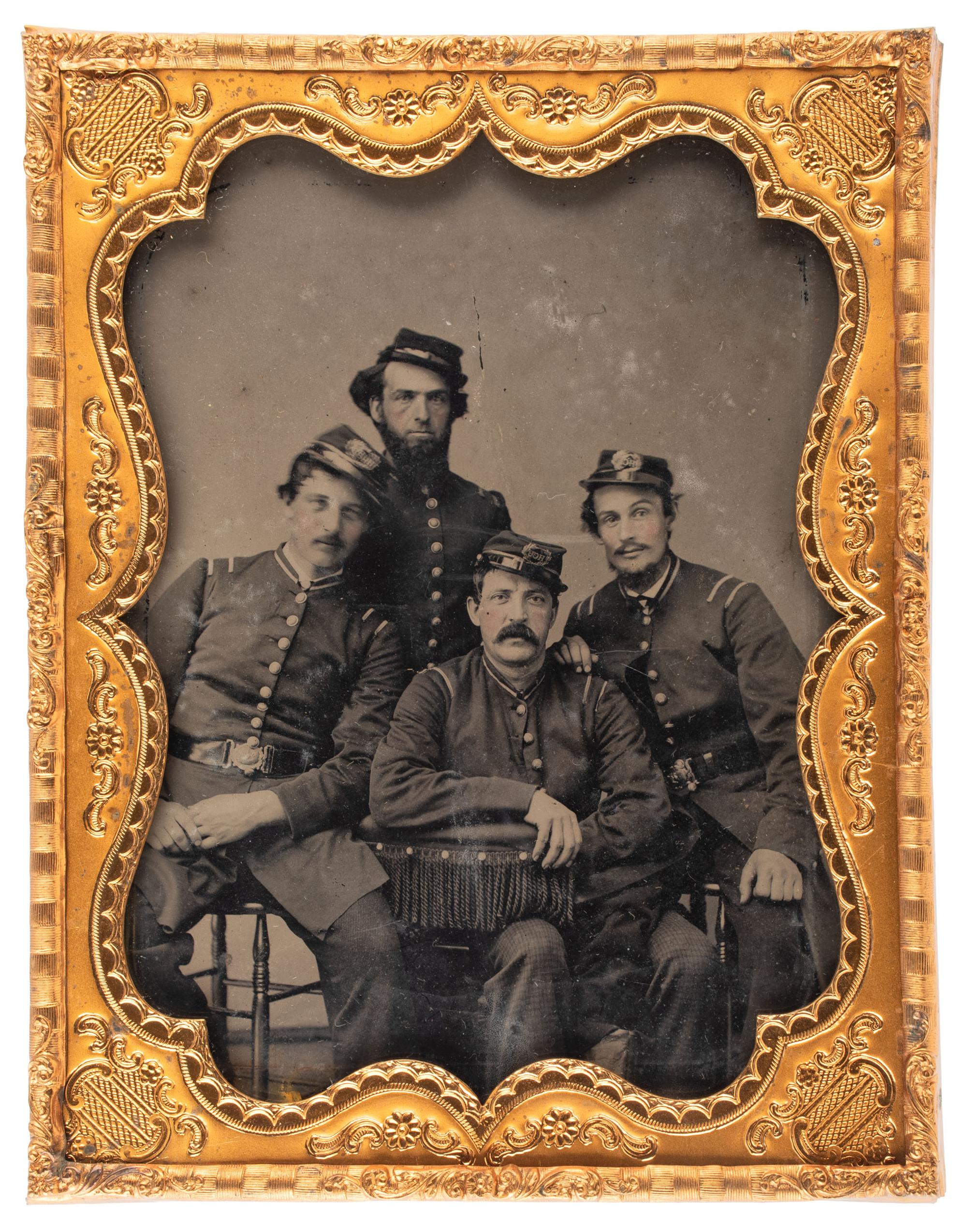 [CIVIL WAR]. Half plate tintype of group of 4 Union privates, possibly from New England. N.p.: n.p., [1860s].