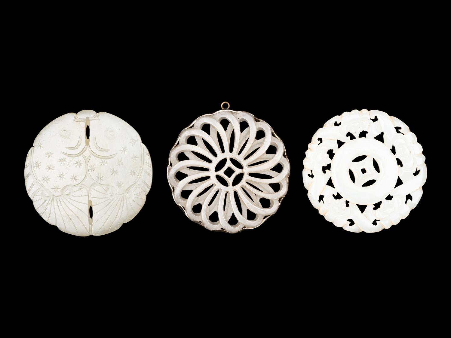 Three Pale Celadon Jade Pendants