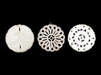 Three Pale Celadon Jade Pendants