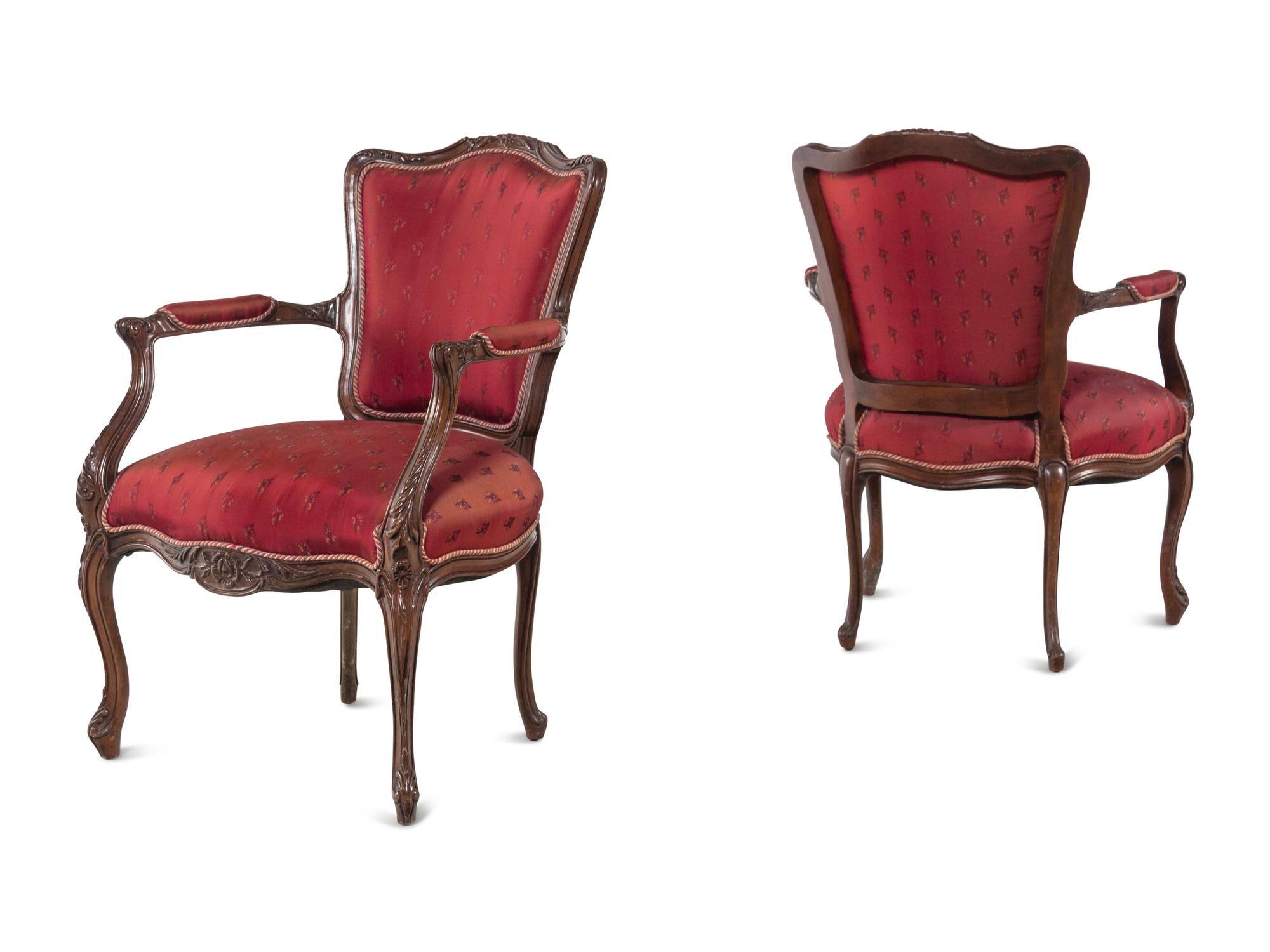 A Pair of Louis XV Style Walnut Fauteuils