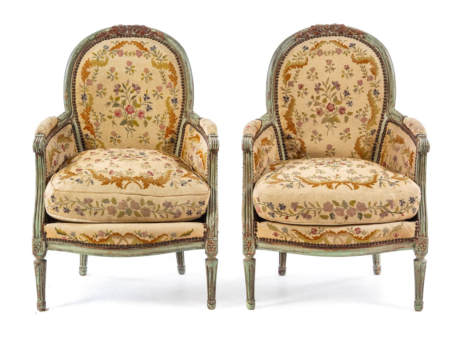 A Pair of Louis XVI Style Painted and Parcel Gilt Bergeres Height 37 1/4 inches. — LATE 19TH/EARLY 20TH CENTURY WITH LATER PAINT