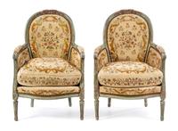 A Pair of Louis XVI Style Painted and Parcel Gilt Bergeres Height 37 1/4 inches. — LATE 19TH/EARLY 20TH CENTURY WITH LATER PAINT