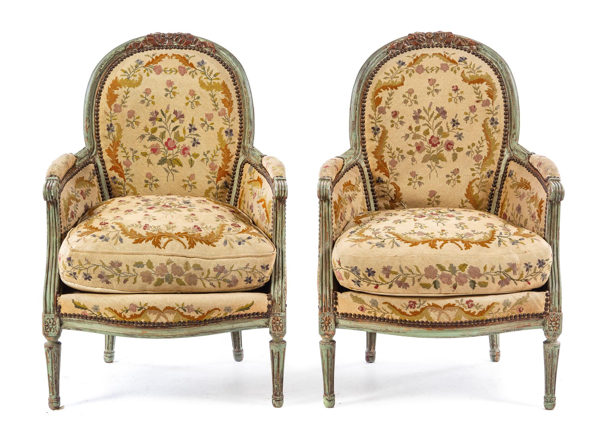 A Pair of Louis XVI Style Painted and Parcel Gilt Bergeres Height 37 1/4 inches. — LATE 19TH/EARLY 20TH CENTURY WITH LATER PAINT
