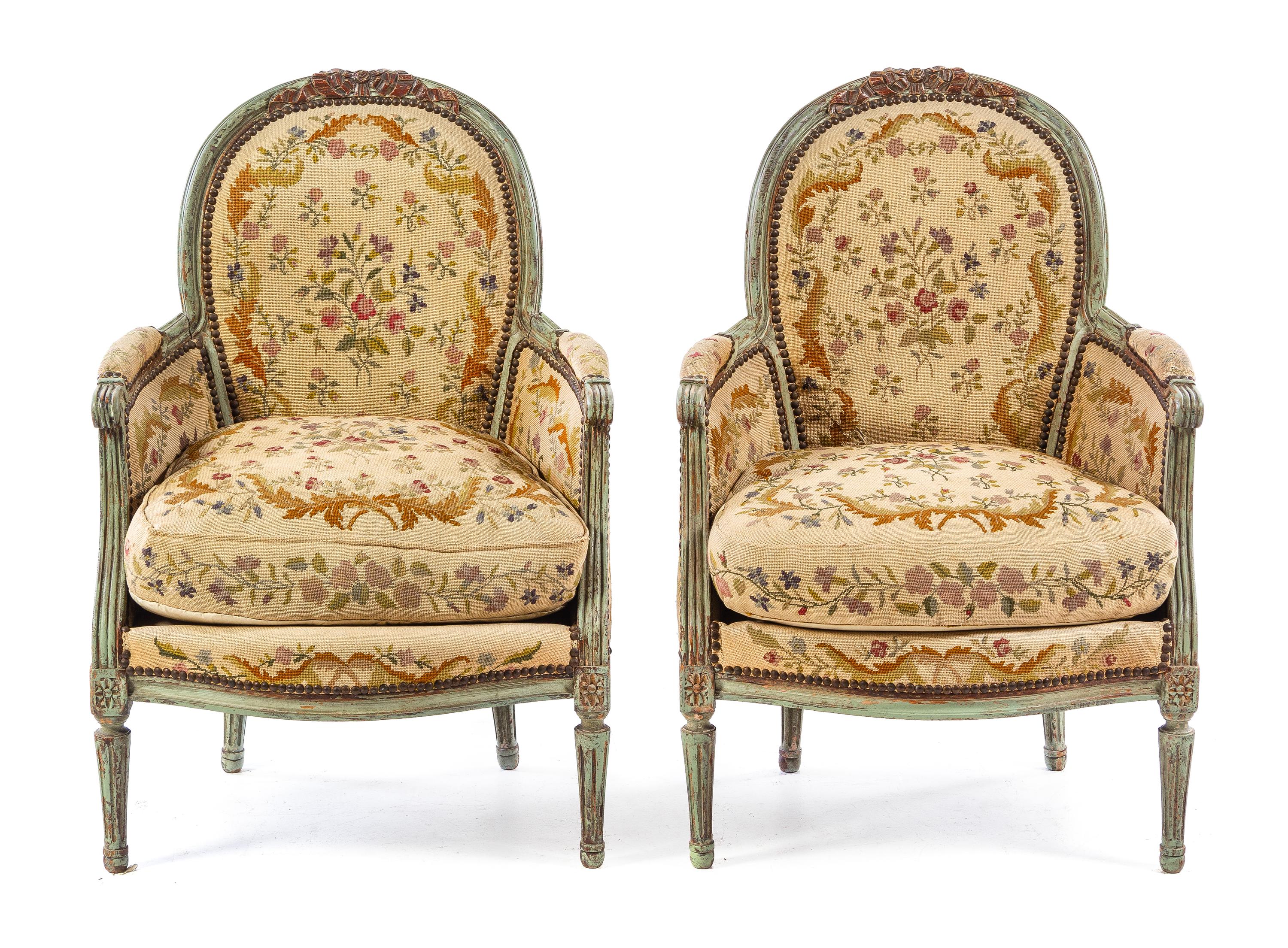 A Pair of Louis XVI Style Painted and Parcel Gilt Bergeres Height 37 1/4 inches. — LATE 19TH/EARLY 20TH CENTURY WITH LATER PAINT