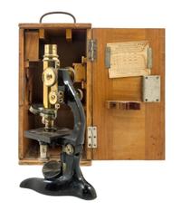 A German Brass and Black Lacquered Microscope Height 10 3/4 inches. — LEITZ, RETAILED BY LYNES MATHEWS, CAPETOWN, EARLY 20TH CENTURY