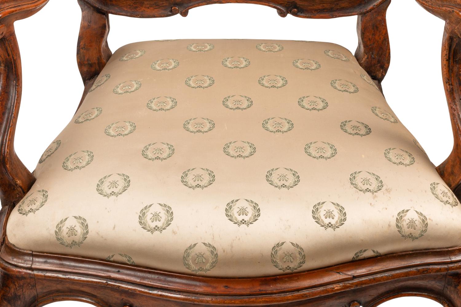 A Pair of Venetian Carved Walnut Armchairs