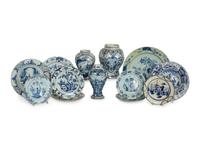 A Group of Thirteen Delft Earthenware Plates and Chargers