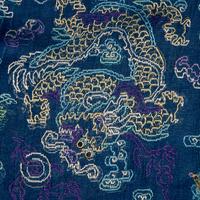 A Chinese Summer Gauze 'Dragon' Robe, Jifu, Late 19th Century 清晚期 藍地納紗繡雲龍紋夏吉服
