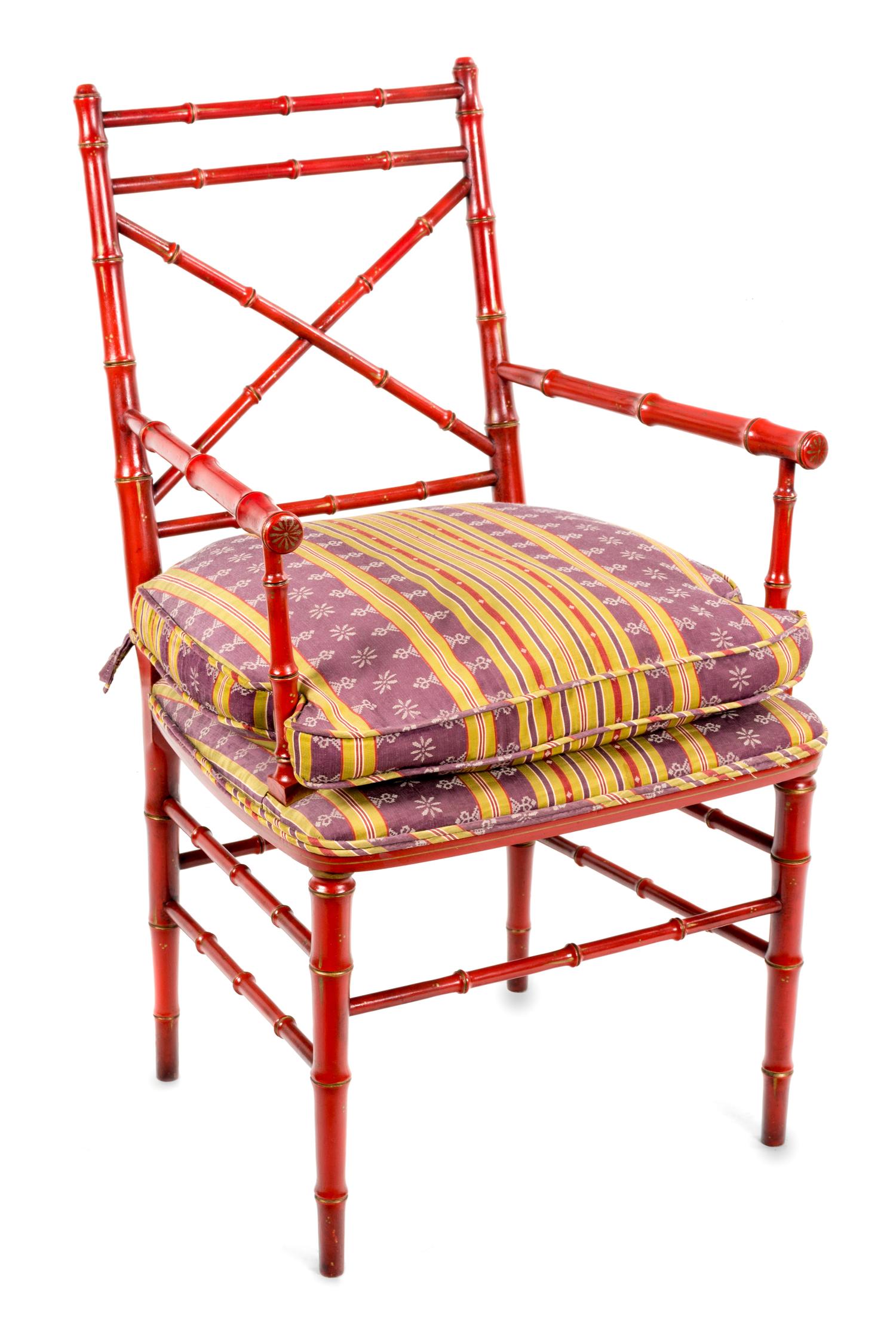 A Regency Style Red-Painted and Parcel Gilt Bamboo Molded Armchair Height 37 3/4 inches.