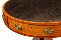 A Regency Mahogany and Satinwood Drum Table