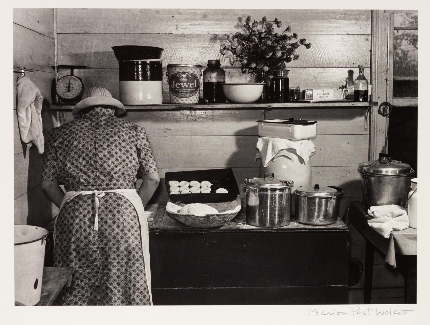 A group of five photographs ( A member of the Wilkins Family Making Biscuits , 1939; Post Office in Blizzard, Aspen, CO , 1941; Negro (Black) Man Entering Movie Theater by Colored Entrance, Belzoni, Miss., 1939; Crossroad and General Store (Mosquito Crossing) Near Greensboro, GA, 1939 (printed 1981); Recreation Evening at Community School Under Direction of WPA Recreational Supervisor (in suit and tie) Coffee County, Alabama, 1939)