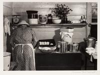 A group of five photographs ( A member of the Wilkins Family Making Biscuits , 1939; Post Office in Blizzard, Aspen, CO , 1941; Negro (Black) Man Entering Movie Theater by Colored Entrance, Belzoni, Miss., 1939; Crossroad and General Store (Mosquito Crossing) Near Greensboro, GA, 1939 (printed 1981); Recreation Evening at Community School Under Direction of WPA Recreational Supervisor (in suit and tie) Coffee County, Alabama, 1939)
