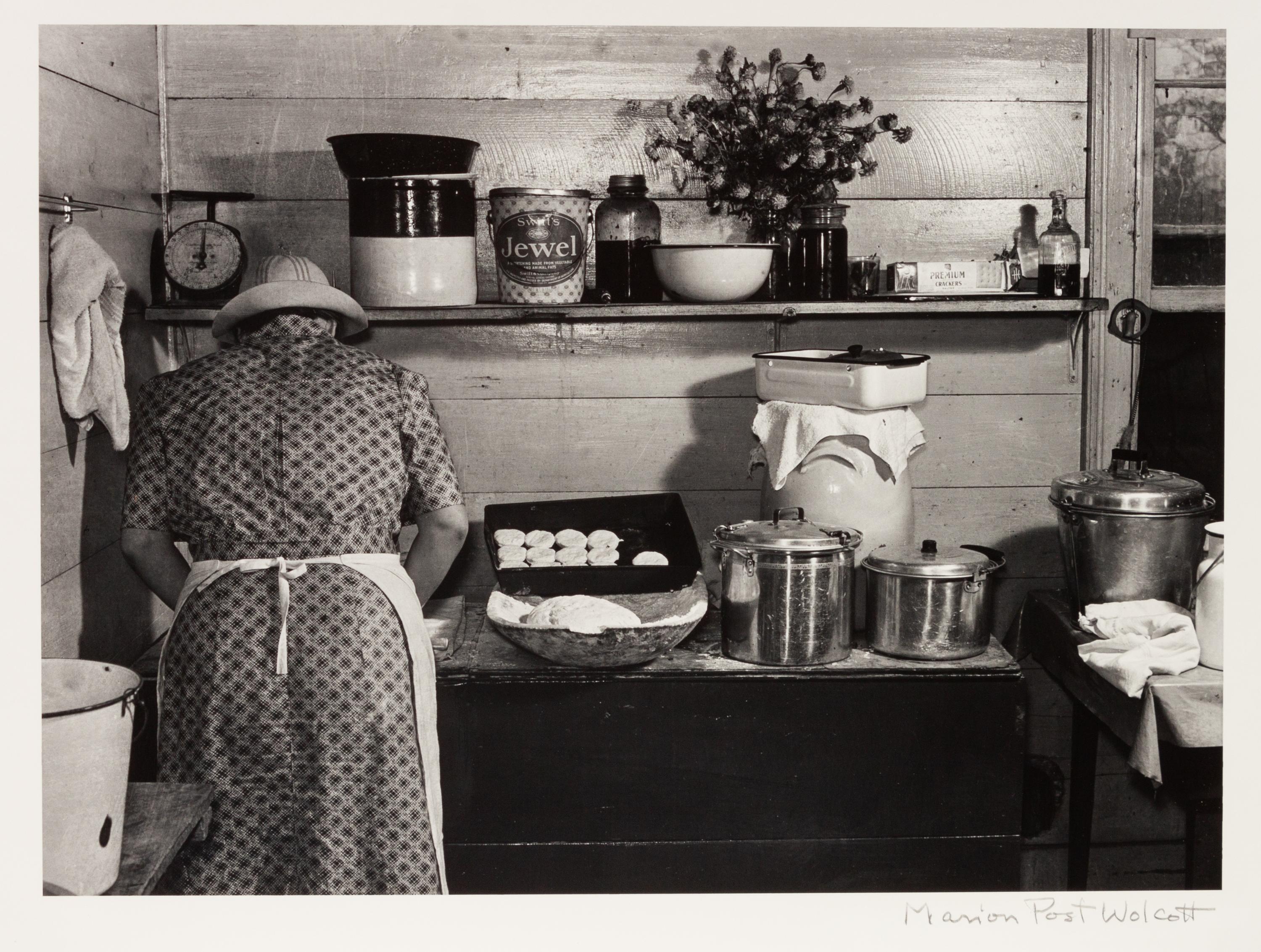 A group of five photographs ( A member of the Wilkins Family Making Biscuits , 1939; Post Office in Blizzard, Aspen, CO , 1941; Negro (Black) Man Entering Movie Theater by Colored Entrance, Belzoni, Miss., 1939; Crossroad and General Store (Mosquito Crossing) Near Greensboro, GA, 1939 (printed 1981); Recreation Evening at Community School Under Direction of WPA Recreational Supervisor (in suit and tie) Coffee County, Alabama, 1939)