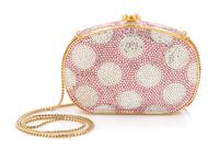 A Judith Leiber Pale Pink Polka Dot Minaudiere, 5.25" x 3.75" x 1.25"; Strap drop 19".