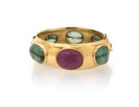 An 18 Karat Yellow Gold, Emerald and Ruby Bangle Bracelet, 47.20 dwts.