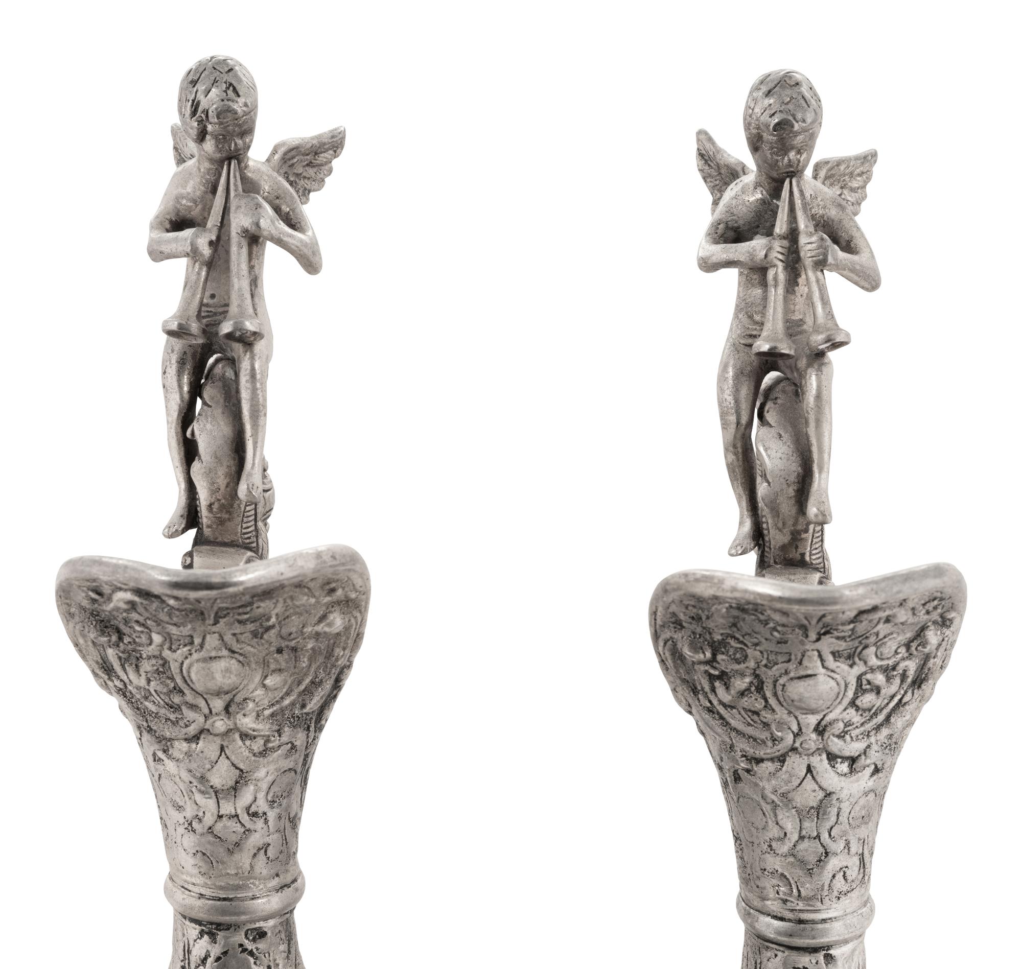 A Pair of Neoclassical Style White Metal Ewers