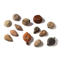 Thirteen Roman and Holy Land Terracotta Lamps