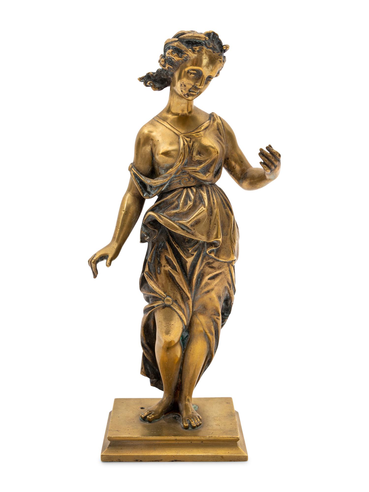 A Gilt Bronze Figure of a Muse