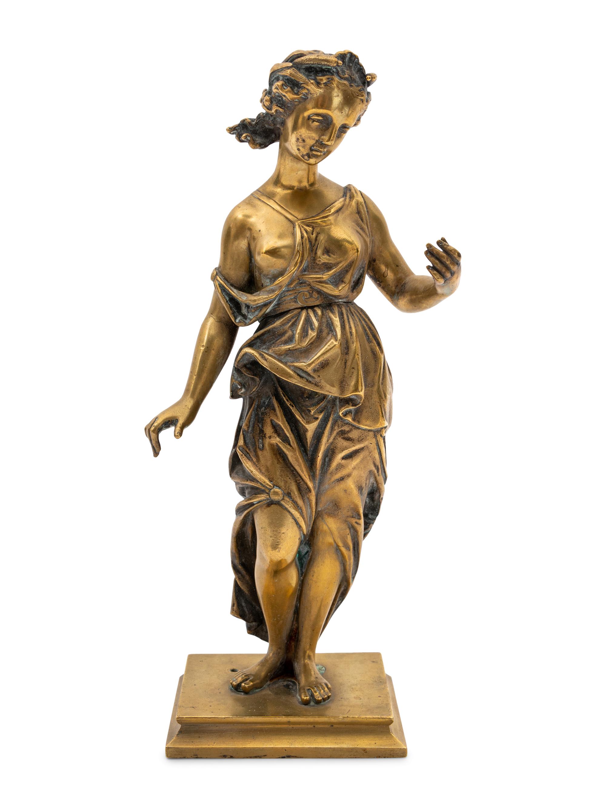 A Gilt Bronze Figure of a Muse