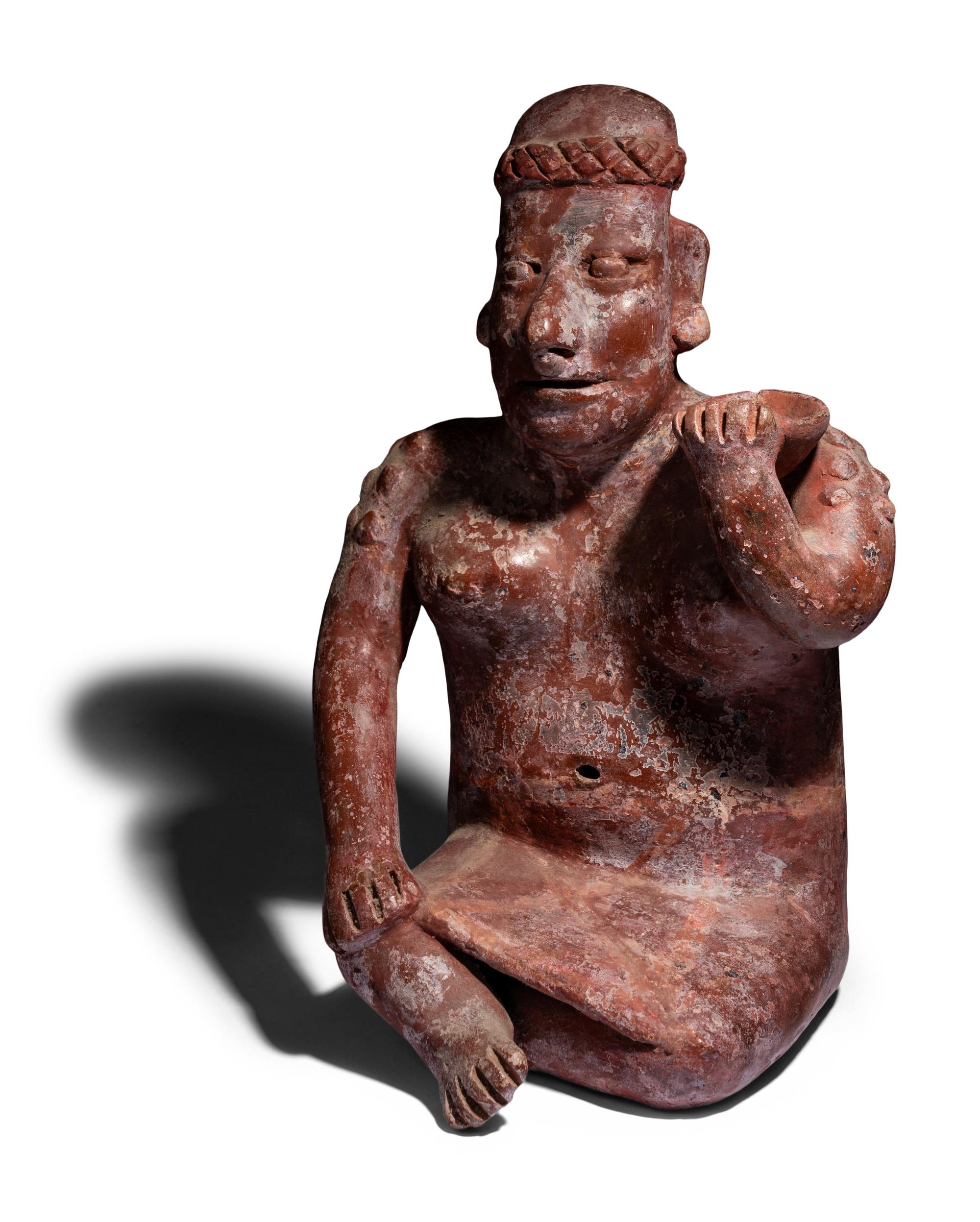 A Colima Seated Figure
