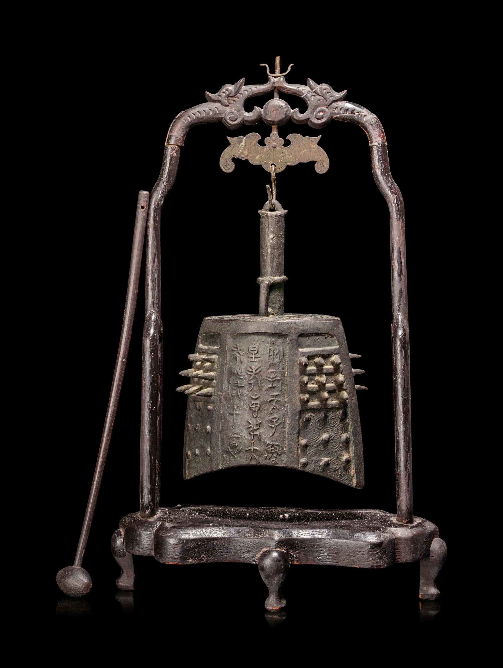 A Chinese Bronze Bell with Stand