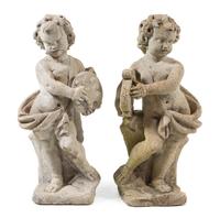 A Pair of Cast Stone Garden Figures Height 32 inches. — 20TH CENTURY