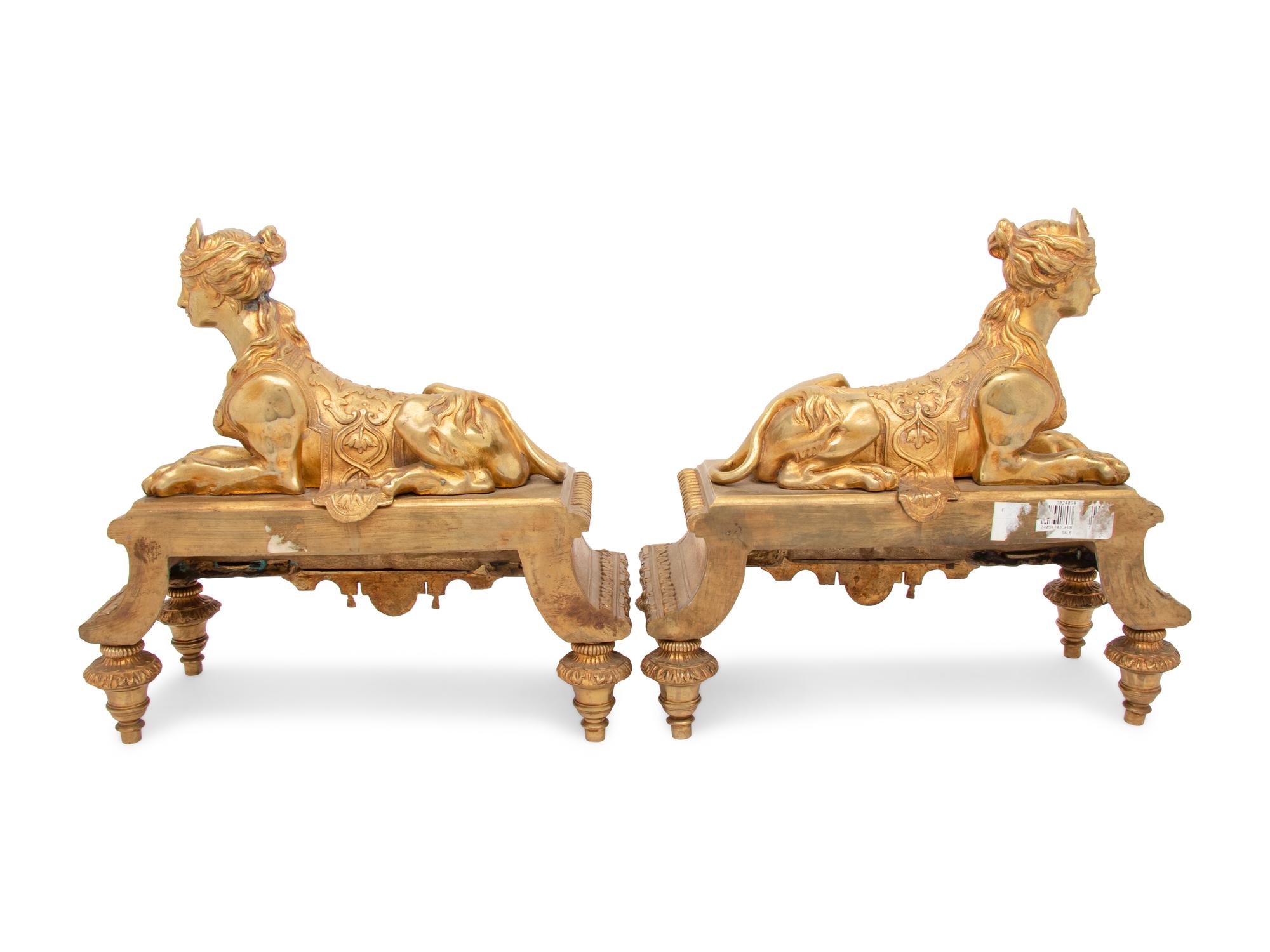 A Pair of Régence Style Gilt Bronze Chenets