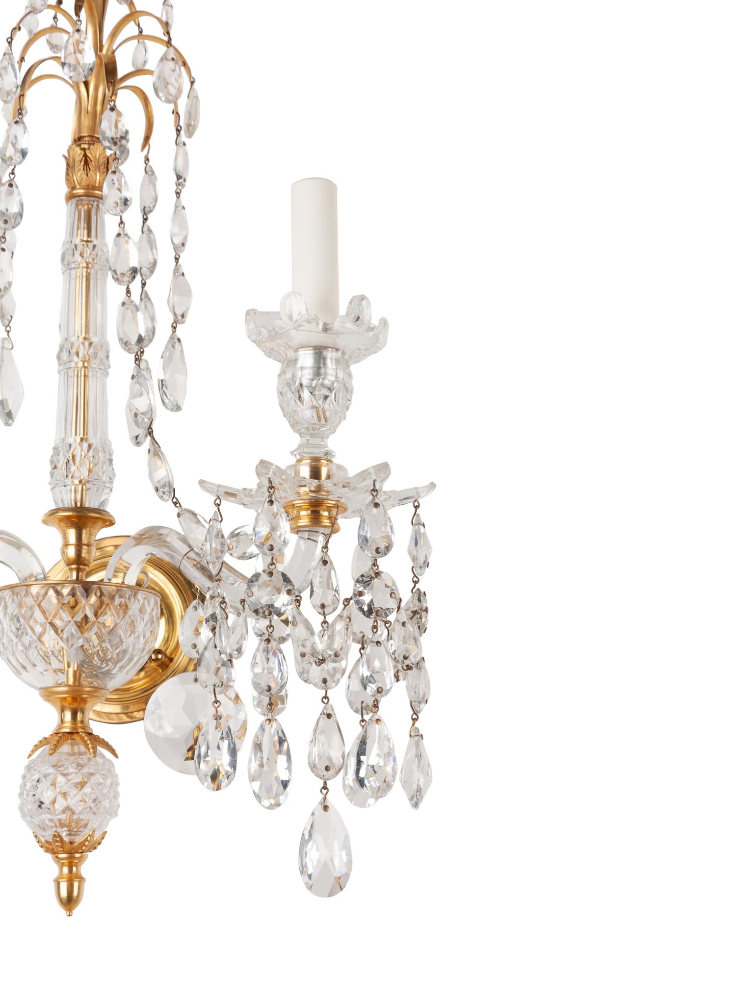 A Set of Four Georgian Style Cut Glass Two-Light Sconces