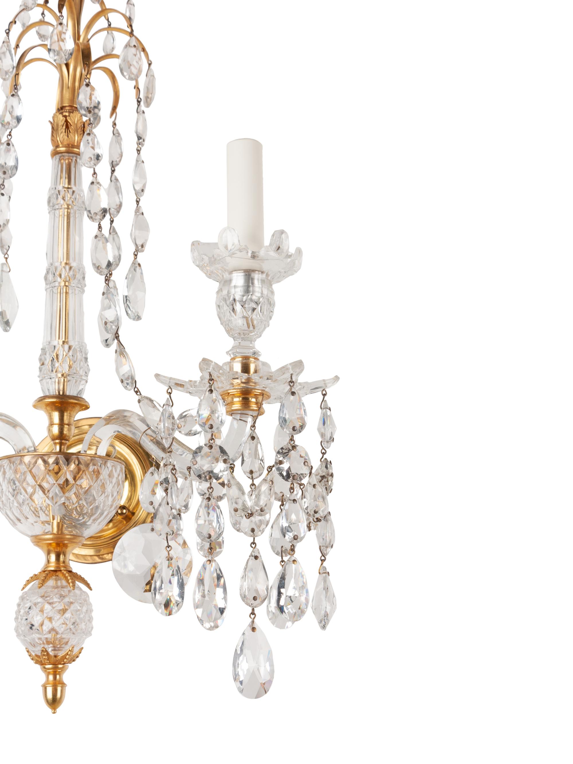 A Set of Four Georgian Style Cut Glass Two-Light Sconces
