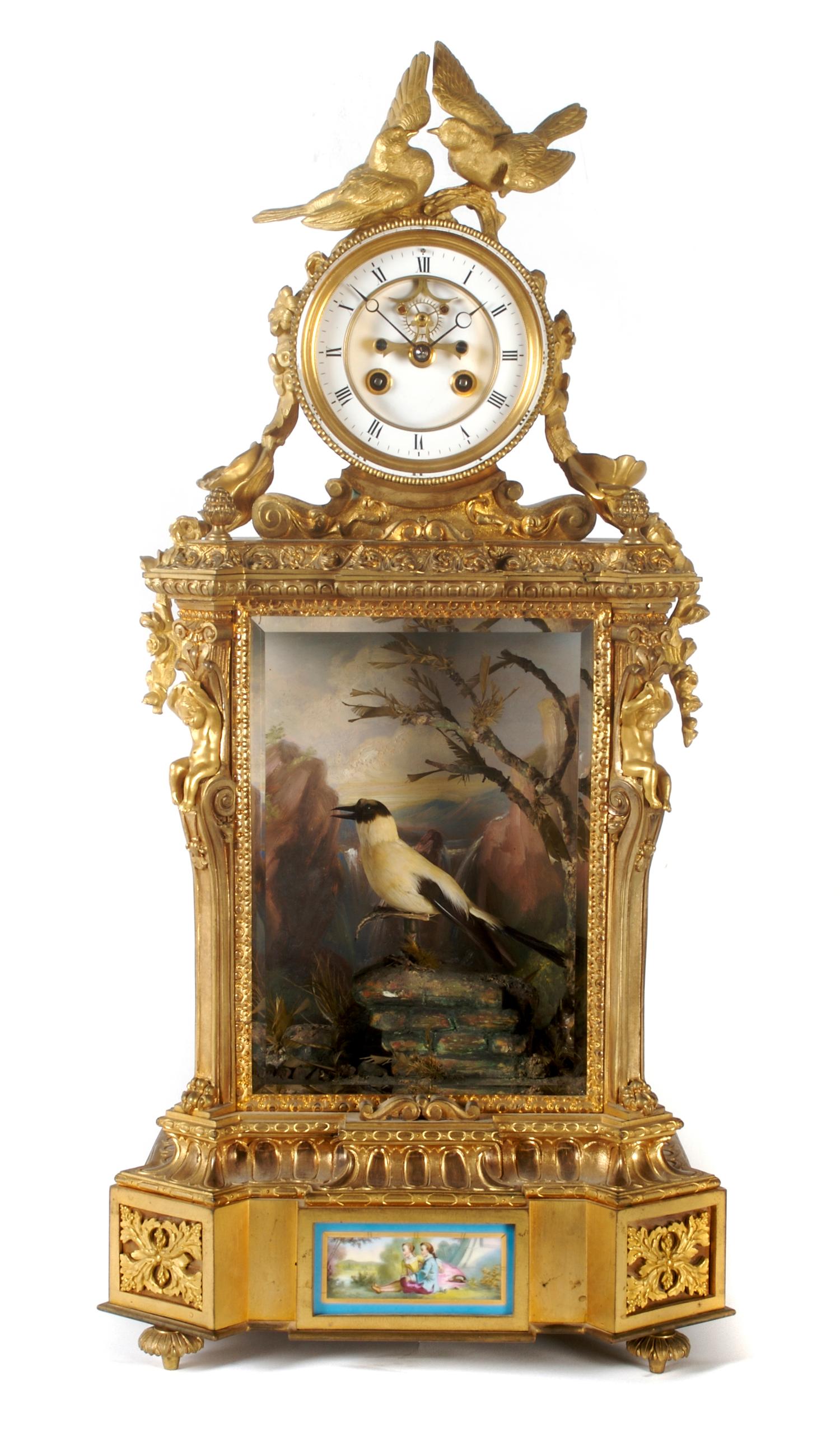 A French Porcelain Mounted Gilt Bronze Singing Bird Automaton Clock
