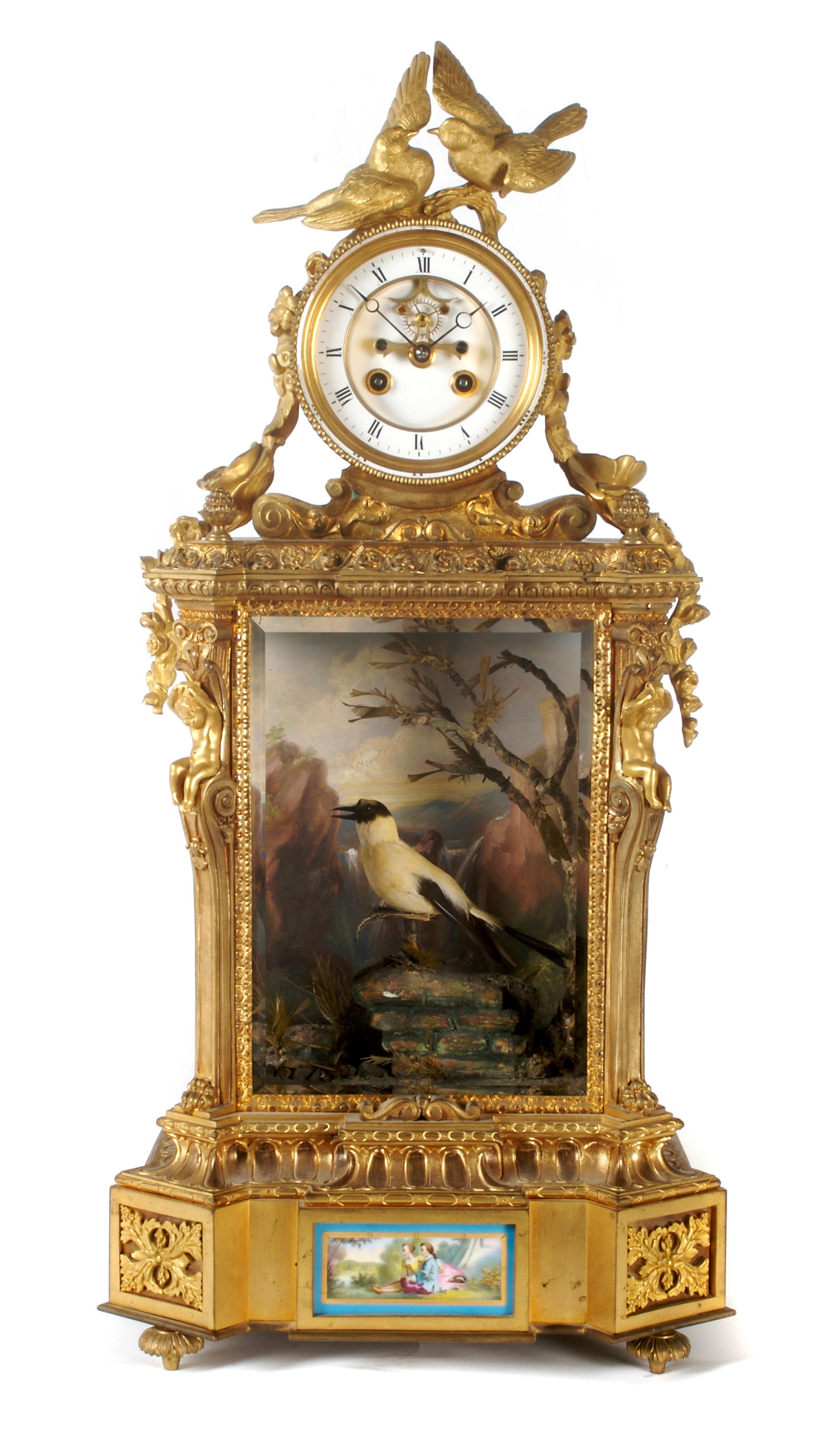 A French Porcelain Mounted Gilt Bronze Singing Bird Automaton Clock
