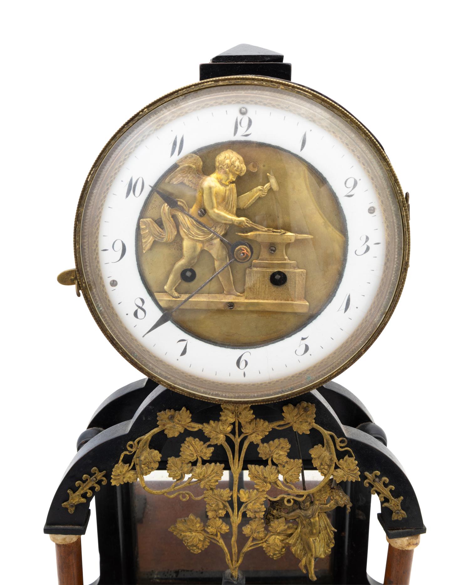 An Empire Gilt Metal Mounted Walnut Mantel Clock
