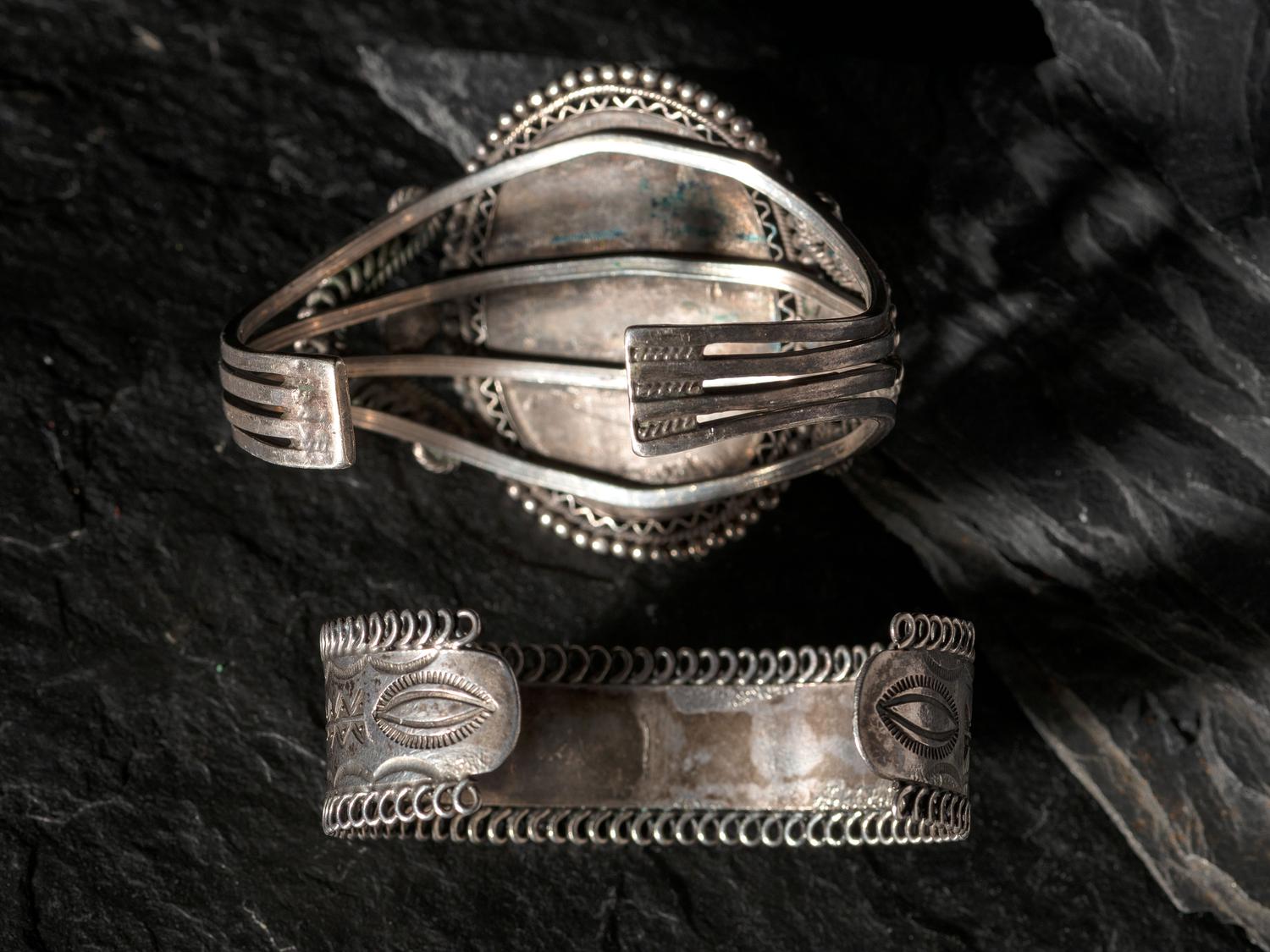 Pair of Navajo or Pueblo Silver and Turquoise Cuff Bracelets, with Filagree Accents