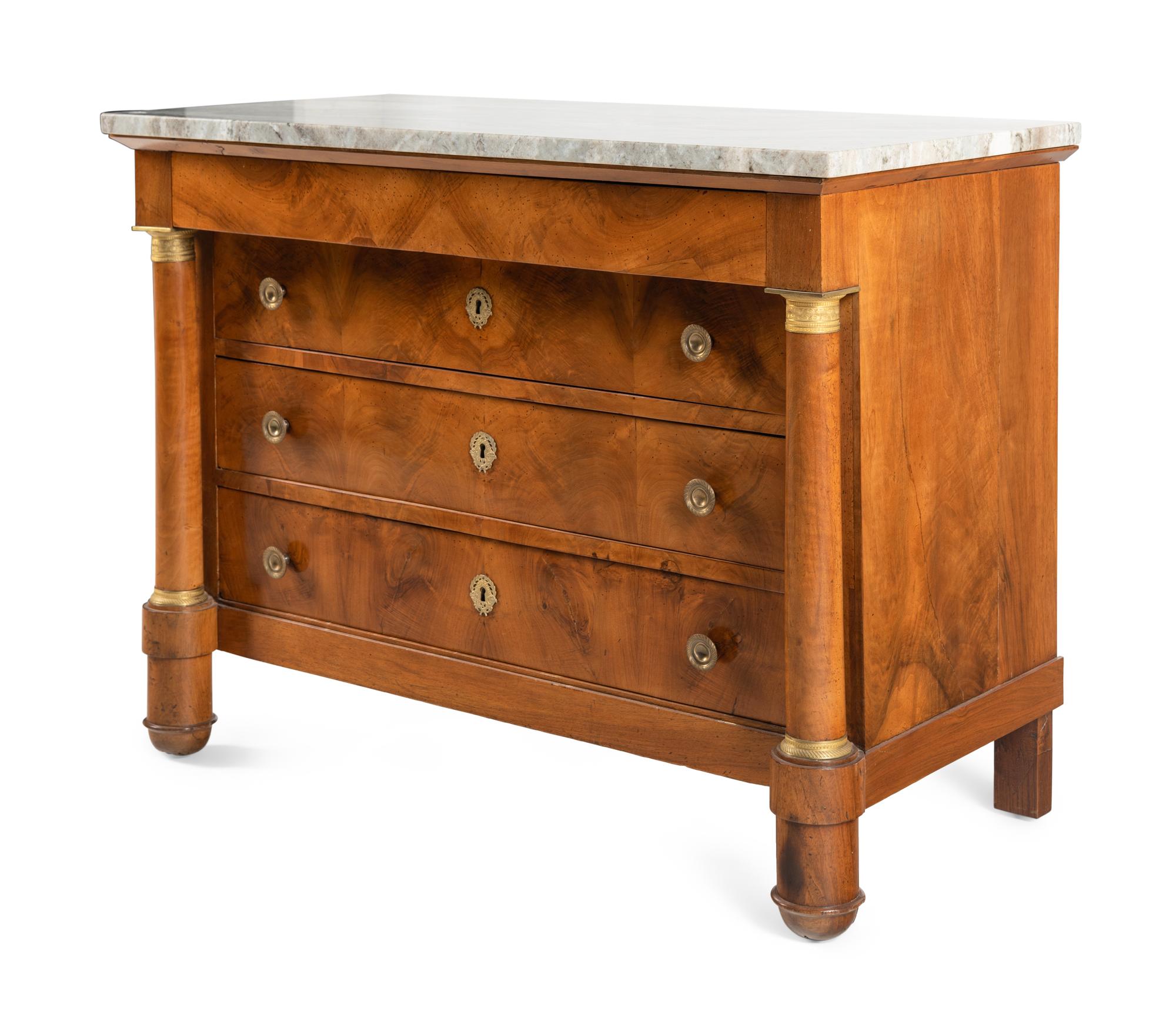 An Empire Gilt Bronze Mounted Walnut Marble-Top Commode