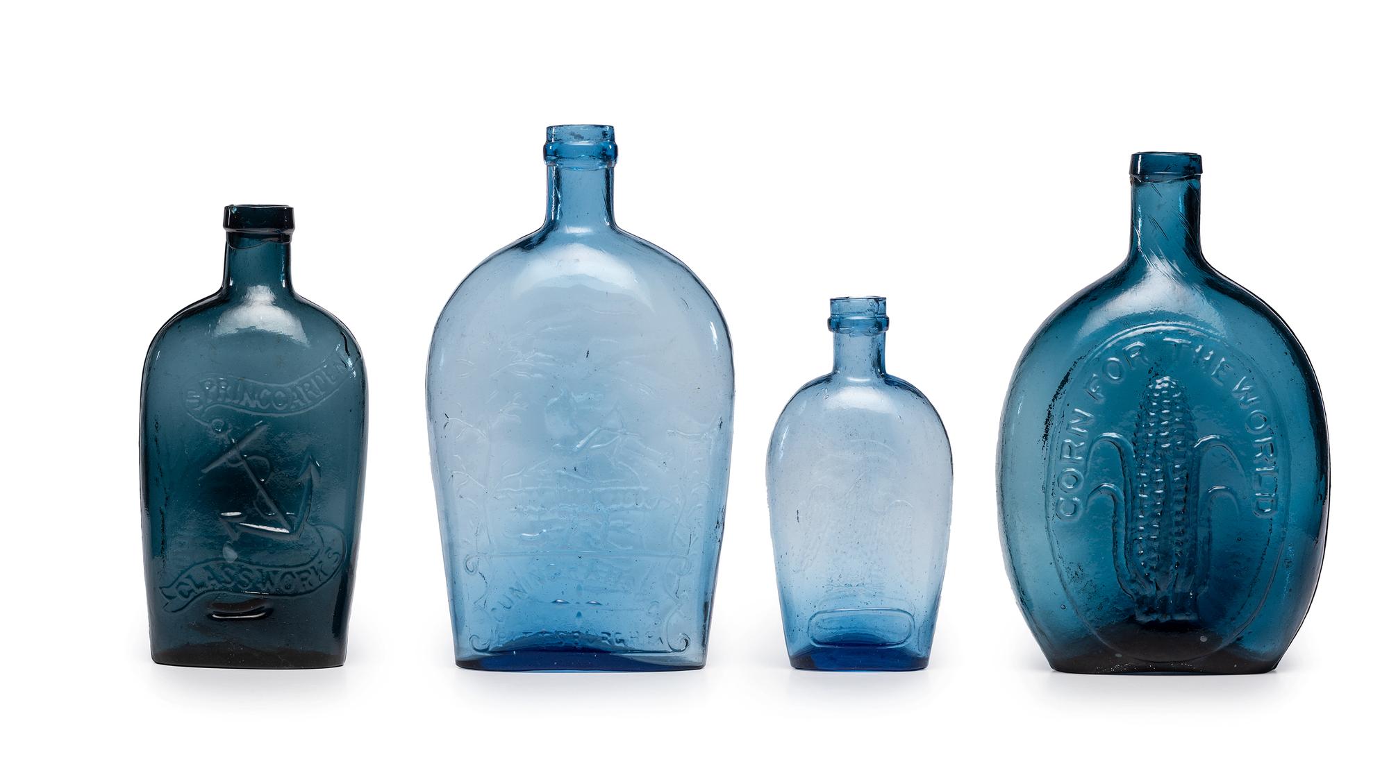 Four Molded Glass Aqua Flasks