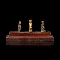 An Unusual Group of Three Chinese Gilt Bronze Miniature Deities, Ming Dynasty 明 銅鎏金袖珍小佛一組三件