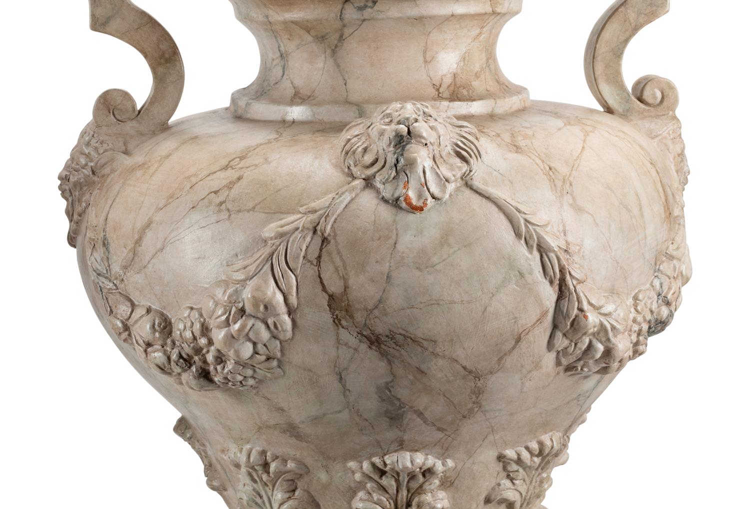 A Pair of Neoclassical Style Faux Marble Painted Terracotta Urns and Stone Plinths