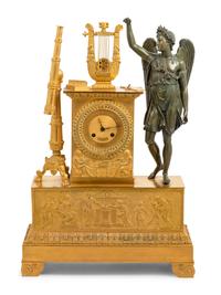 An Empire Gilt and Patinated Bronze Figural Mantel Clock