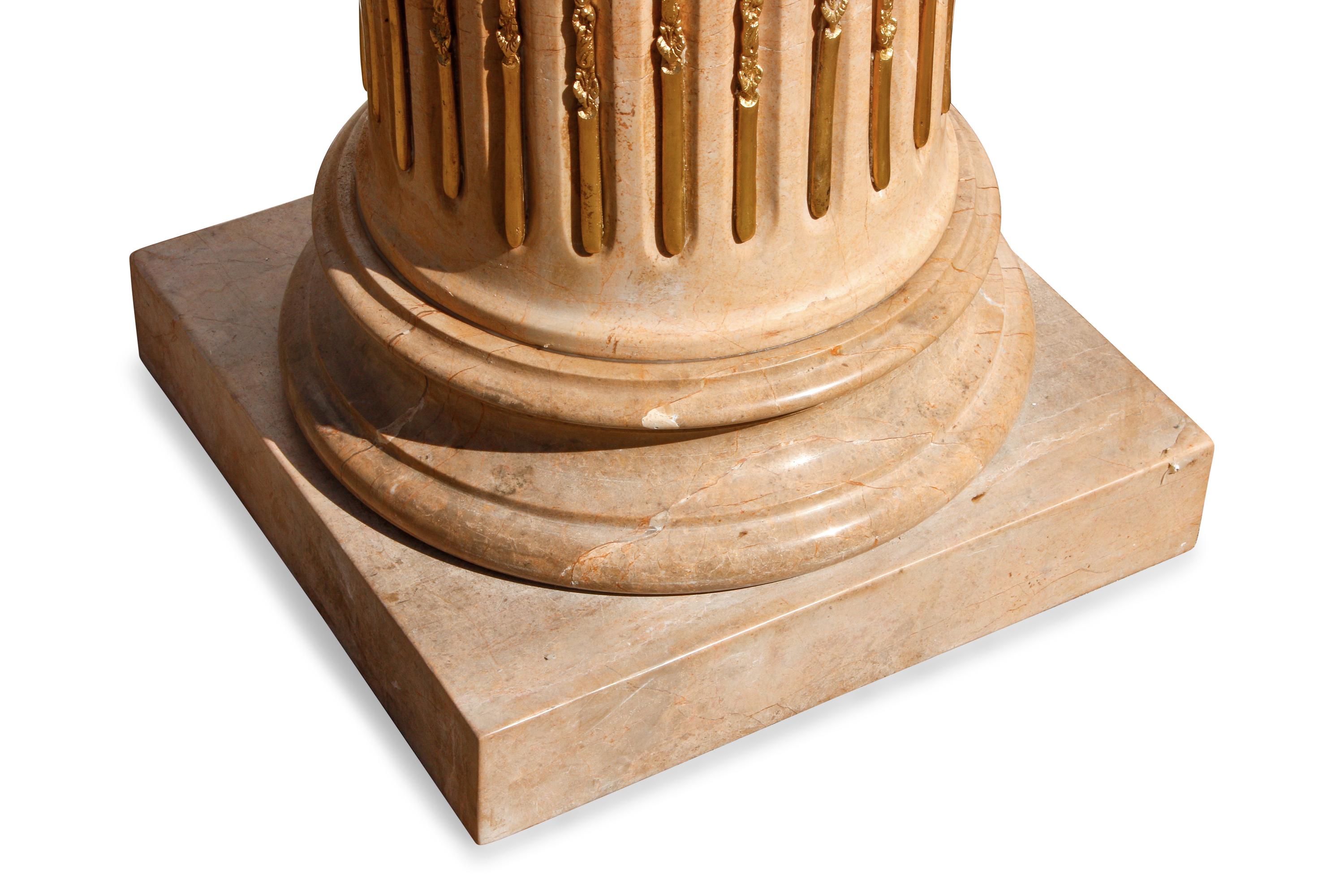 A Pair of Fluted Marble and Gilt Bronze Mounted Pedestals