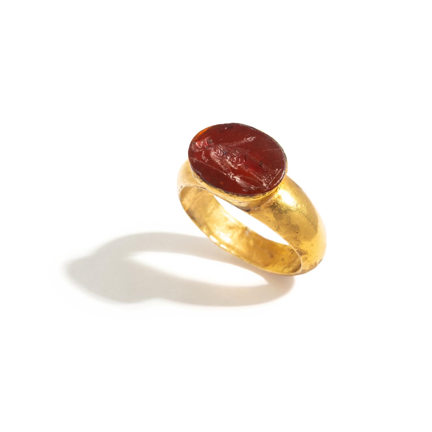A Roman Gold and Carnelian Finger Ring with the Goddess Minerva