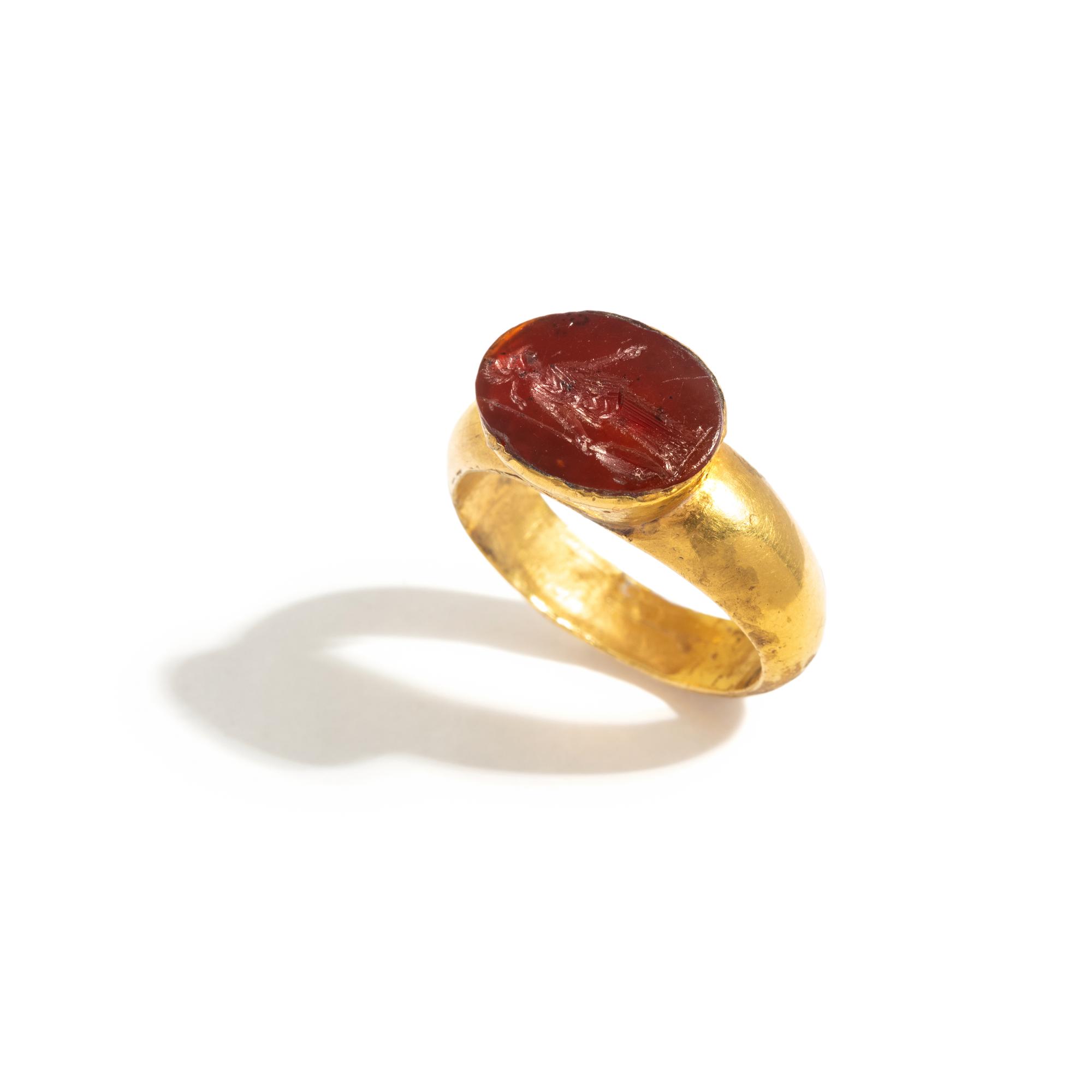 A Roman Gold and Carnelian Finger Ring with the Goddess Minerva