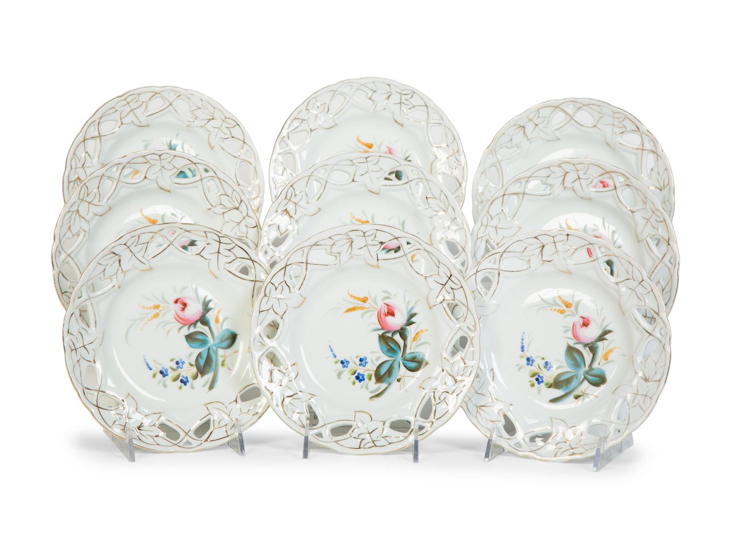 Nine English Porcelain Luncheon Plates and Five Continental Porcelain Cups with Saucers