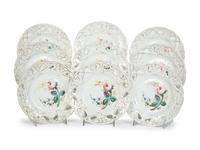 Nine English Porcelain Luncheon Plates and Five Continental Porcelain Cups with Saucers