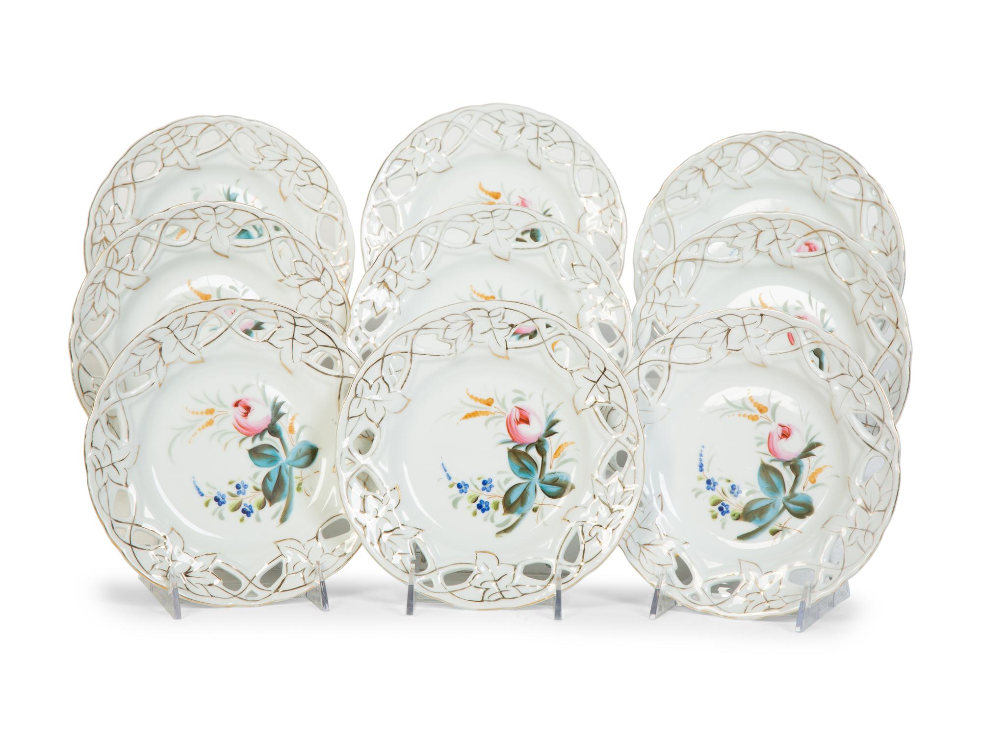 Nine English Porcelain Luncheon Plates and Five Continental Porcelain Cups with Saucers